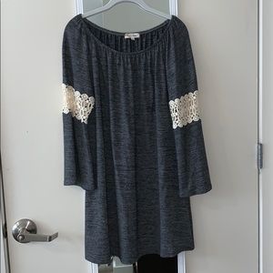 super cute grey dress with lace cut outs on sleeve